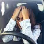 I put a $2,500 emergency car repair on my credit card 2 years ago, but I have since lost my job — I now owe over $4,900 with interest of 25%. How can I get out of this mess?