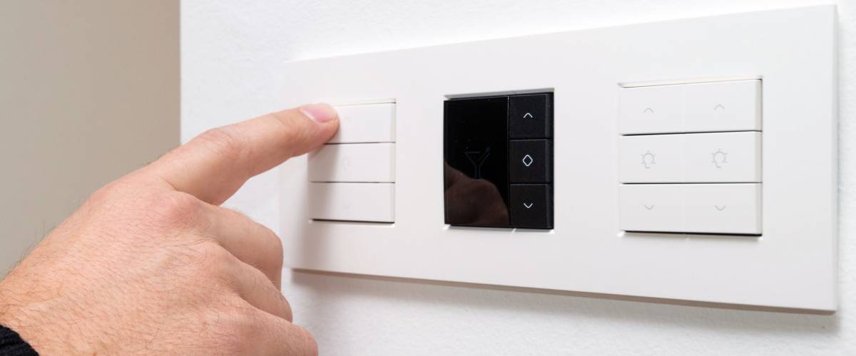 Closeup shot of man's hand controlling multipurpose switch