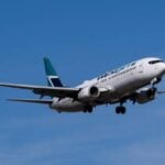 Canadians cut US travel by 40% as tariffs spark boycott movement
