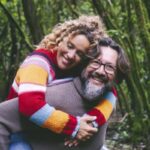 I’m 53 and currently have a lot more saved for retirement than my wife does. How should we strategically save to maximize our gains and meet both our needs?